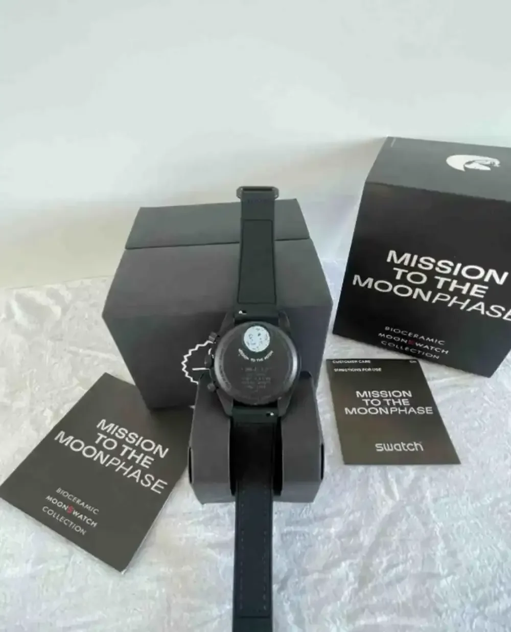 OMEGA x Swatch MISSION TO THE MOONPHASE NEW MOON Black Bioceramic Snoopy Watch.